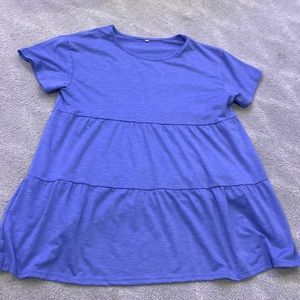 The color is light purple super cute and soft top!Size small!